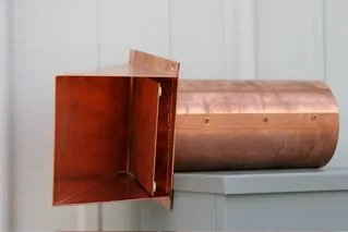 Copper dryer vent with a flat hood, front view